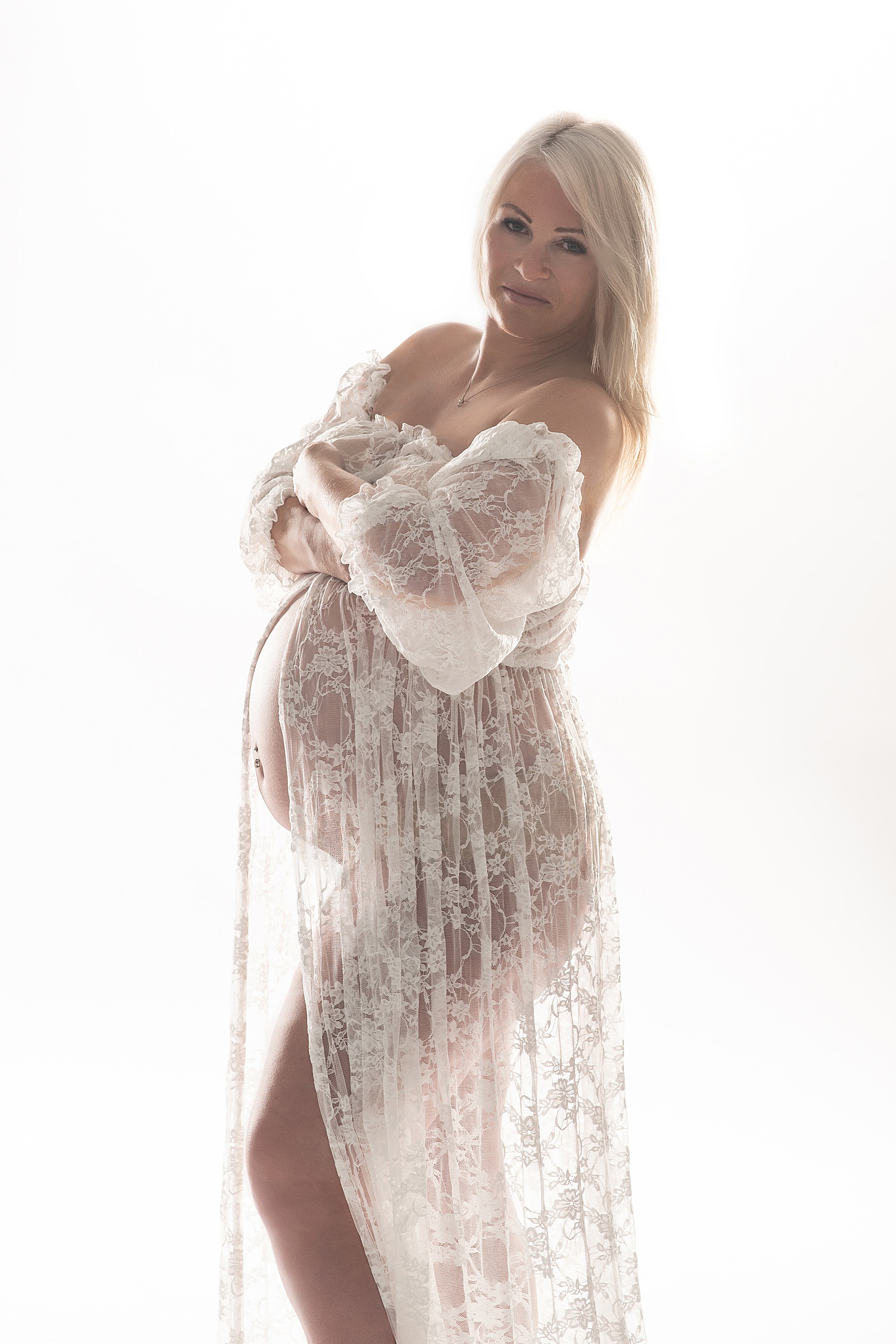 mom to be in sheer maternity gown